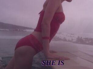 SHE_IS